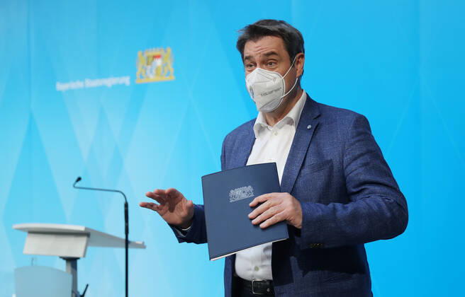 Press conference of Prime Minister Markus Söder Soeder Dr Markus Söder making small talk with some journalists after the official press conference, Munich Bavaria Germany Prinz Carl Palais