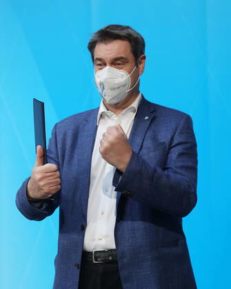Press conference of Prime Minister Markus Söder Soeder Dr Markus Söder making small talk with some journalists after the official press conference, Munich Bavaria Germany Prinz Carl Palais