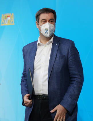 Press conference of Prime Minister Markus Söder Soeder Dr Markus Söder making small talk with some journalists after the official press conference, Munich Bavaria Germany Prinz Carl Palais