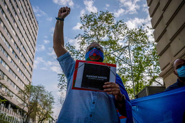 April 8, 2021, Madrid, Spain: A protester holds up his fist during the demonstration..As part of the International Day of the Gypsy People, the Gypsy community in Madrid demonstrate on the street Marques de la Ensenada claiming that this street has the name of a Spanish Marquis who between 1749 and 1793 carried out an operation to exterminate the race Roma in Spain, arresting and murdering tens of thousands of Roma men, women and children, they also came together to demand justice for the death of Eleazar Garcia, a young gypsy with a severe brain disability who was detained by police and security guards at the El Molinon stadium in Gijon on September 8, 2019 during a football match of the Spanish selection. During the arrest he died - ZUMAs197 20210408_zaa_s197_142 Copyright: xDiegoxRadamesx