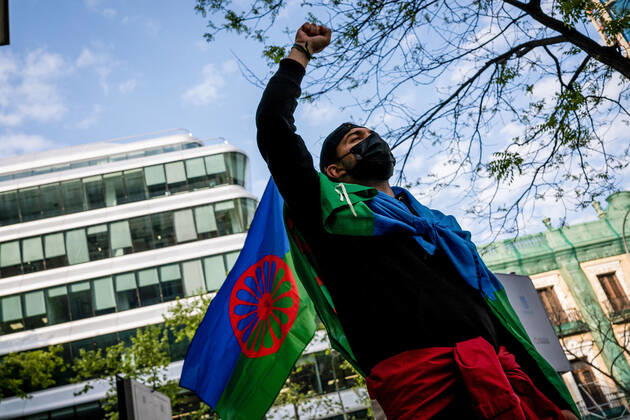 April 8, 2021, Madrid, Spain: A protester holds up his fist during the demonstration..As part of the International Day of the Gypsy People, the Gypsy community in Madrid demonstrate on the street Marques de la Ensenada claiming that this street has the name of a Spanish Marquis who between 1749 and 1793 carried out an operation to exterminate the race Roma in Spain, arresting and murdering tens of thousands of Roma men, women and children, they also came together to demand justice for the death of Eleazar Garcia, a young gypsy with a severe brain disability who was detained by police and security guards at the El Molinon stadium in Gijon on September 8, 2019 during a football match of the Spanish selection. During the arrest he died - ZUMAs197 20210408_zaa_s197_149 Copyright: xDiegoxRadamesx