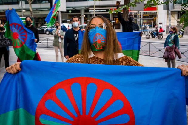 April 8, 2021, Madrid, Spain: A protester holds up his fist during the demonstration as part of the International Day of the Gypsy People, the Gypsy community in Madrid demonstrate on the street Marques de la Ensenada claiming that this street has the name of a Spanish Marquis who between 1749 and 1793 carried out an operation to exterminate the race Roma in Spain. Madrid Spain - ZUMAs197 20210408_zaa_s197_148 Copyright: xDiegoxRadamesx