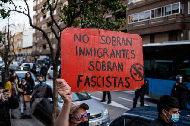 April 12, 2021, Madrid, Spain: A protester holds a placard during the demonstration..The far-right party VOX held an electoral act with Deputy Javier Ortega Smith in the Plaza de Canal de Isabel II, in the Tetuan neighborhood, Madrid. Neighborhood groups organized a demonstration against the rally that was broken up by the Spanish police. Madrid Spain - ZUMAs197 20210412_zaa_s197_283 Copyright: xDiegoxRadamesx