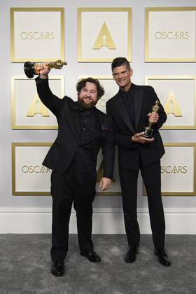 April 25, 2021, Los Angeles, California, USA: Michael Govier and Will McCormack pose backstage with the Oscar for Animated Short Film during the live ABC Telecast of The 93rd Oscars at Union Station in Los Angeles. Los Angeles USA  - ZUMAz03_ 20210425_sso_z03_222 Copyright: xMattxPetit AMPASx