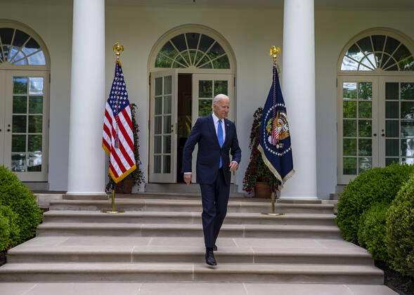 United States President Joe Biden enters the Rose Garden to give remarks on the new Covid-19 Centers for Disease Control mask guidelines in the Rose Garden, at the White House in Washington, DC on Thursday, May 13, 2021. Fully vaccinated people no longer need to wear a face mask or stay six feet away from others in most settings, whether outdoors or indoors, the Centers for Disease Control and Prevention said in updated public health guidance released Thursday. Copyright: xPoolxviaxCNPx MediaPunchx