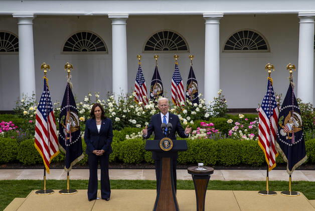 United States President Joe Biden gives remarks on the new Covid-19 Centers for Disease Control mask guidelines in the Rose Garden, at the White House in Washington, DC on Thursday, May 13, 2021. Fully vaccinated people no longer need to wear a face mask or stay six feet away from others in most settings, whether outdoors or indoors, the Centers for Disease Control and Prevention said in updated public health guidance released Thursday. US Vice President Kamala Harris stands at left. Copyright: xPoolxviaxCNPx MediaPunchx