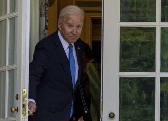 United States President Joe Biden walks away after giving remarks on the new Covid-19 Centers for Disease Control mask guidelines in the Rose Garden, at the White House in Washington, DC on Thursday, May 13, 2021. Fully vaccinated people no longer need to wear a face mask or stay six feet away from others in most settings, whether outdoors or indoors, the Centers for Disease Control and Prevention said in updated public health guidance released Thursday. Copyright: xPoolxviaxCNPx MediaPunchx