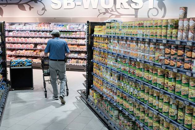 Duesseldorf 04 06 2021 supermarket discounter branch goods shelf shelf canned soups canned can customer shopping cart aisle sausage counter Duesseldorf North Rhine Westphalia Germany