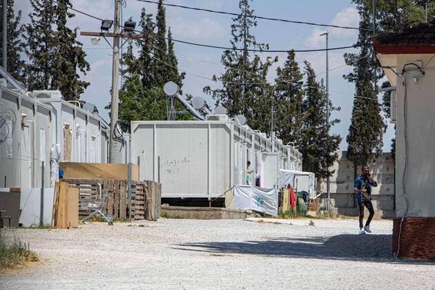 New Concrete Walls Around Diavata Refugee Camp In Greece Greece is building new concrete walls around the refugee camps across the country in the mainland and the islands. The 3meter wall was a decision by the Greek Ministry of Migration and European Commission. Asylum seekers feel like imprisonment conditions while the authorities claim its for their own security, monitoring the entrance and locking the camp during the night. Diavata refugee and migrant camp is a former military camp near the city of Thessaloniki in Northern Greece. The concrete fortification called enhanced fence has been built around the whole area of the camp. Diavata, Greece on June 6, 2021 Thessaloniki Greece economou-notitle210605_npkTU Copyright: xNicolasxEconomoux