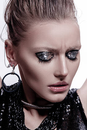 Fashion style girl portrait. Beautiful fashion woman with professional styling, hairdress and makeup; dark glitter eyeshadows, rock style beauty portrait Belarus, Mogilev Region, Belarus CR_PJWUOI210608B-761205-01 ,model released, Symbolfoto