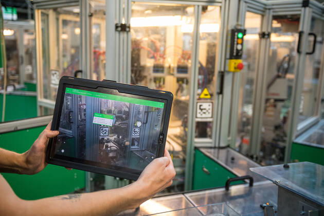 A part of a production plant of the Schneider Electric company is seen on June 17, 2021, in Pisek, Czech Republic. The multinational company manufactures electrical machines, devices and electronic equipment. Maintenance workers use an augmented reality (AR) when maintaining and repairing assembly machines. (CTKxPhoto PetrxSkrivanek) CTKPhotoP2021061804205 SKR_016