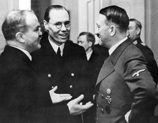 Vyacheslav Mikhailovich Molotov (9 March 1890 8 November 1986) was a Soviet politician and diplomat, an Old Bolshevik, and a leading figure in the Soviet government from the 1920s, when he rose to power as a protÃ gÃ of Joseph Stalin.<br ><br > Molotov served as Chairman of the Council of People s Commissars (Premier) from 1930 to 1941, and as Minister of Foreign Affairs from 1939 to 1949 and from 1953 to 1956. He served as First Deputy Premier from 1942 to 1957, when he was dismissed from the Presidium of the Central Committee by Nikita Khrushchev.<br ><br > Adolf Hitler (20 April 1889 30 April 1945) was a German politician of Austrian origin who was the leader of the Nazi Party (NSDAP), Chancellor of Germany from 1933 to 1945, xSupplier:xCPAxMediaxCo.xLtd.x Copyright: xx