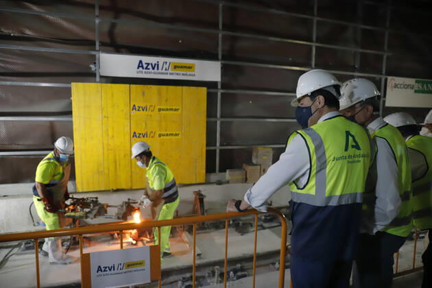 The president of the Junta de Andalucia, Juanma Moreno (c), attends the first welding of the track rail at the Atarazanas metro station. On 26 July 2021, in Malaga (Andalusia, Spain). 26 JULY 2021;PIXELATED Ãlex Zea LagenciaEP 07 26 2021 Malaga (Andalusia) Malaga (Andalusia) Spain Copyright: xÃlexxZeax 3856043