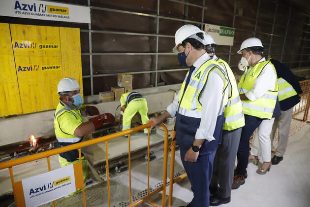 The president of the Junta de Andalucia, Juanma Moreno (c), attends the first welding of the track rail at the Atarazanas metro station. On 26 July 2021, in Malaga (Andalusia, Spain). 26 JULY 2021;PIXELATED Ãlex Zea LagenciaEP 07 26 2021 Malaga (Andalusia) Malaga (Andalusia) Spain Copyright: xÃlexxZeax 3856044
