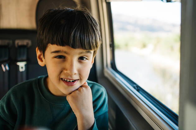 Little boy sitting inside a motorhome while looking at camera, Model released JakeJakab_LikeFatherLikeSon_9.jpg Copyright: xJakexJakabx MR