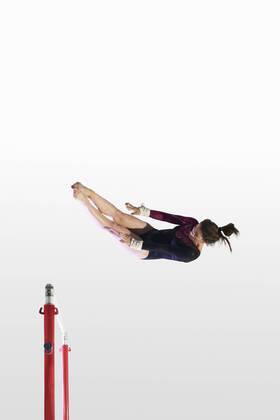 IMAGO Creative: Internationaler Frauenmonat, Mädchen im Sport Young gymnast performing on uneven bars, 25.02.2015, Copyright: xPeterxMullerx, model released, wearing,performing,physical training,practising,recreation,spinning,stretching,white background,motion,studio shot,anticipation,challenge,concentration,control,determination,flexibility,focus concept,adrenaline,competition,dedication,elegance,fitness,fun,grace,healthy lifestyle,motivation,skill,strength,vitality,confidence,exercise equipment,16 to 17 years,caucasian ethnicity,female,teenage girl,only one teenage girl,one person,athlete,indoors,day,action,sportswear,leotard,speed,leisure,sport,gymnastics,active lifestyle,balance,dream,mid air,poised,health,uneven bars,landing,March 2015 Release,Landing,Physical Activity,Practising,Spinning,Stre Ref:IS09AP5GE
