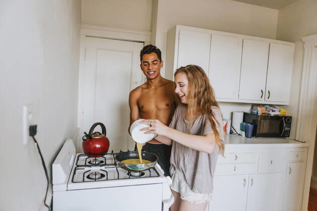 Couple in kitchen cooking breakfast, 13.09.2016, Copyright: xLenaxMirisolax, model released, food preparation,cooking,pouring,three quarter length,preparation,youth,teamwork,togetherness,friendship,happiness,love,young love,18 to 19 years,caucasian ethnicity,hispanic ethnicity,female,woman,young woman,male,man,young man,couple,heterosexual couple,young couple,two people,bare chested,indoors,kitchen,day,morning,smiling,egg cuisine,breakfast,kettle,oven,both male and female,youthful,Star Images,September 2016 Release,Pouring,Preparing Food,Cooking,Caucasian Ethnicity,Young Adult,18-19 Years,Female,Women,Young Women,Young Adult Woman,Male,Men,Young Men,Couple,Heterosexual Couple,Young Couple,Love,Morning,Preparation,Relationship,Friendship, Ref:IS09B217X