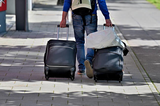 Everything with you With suitcases, backpack and bag it goes on the big journey Munich Bavaria Germany Copyright: xRolfxPossx