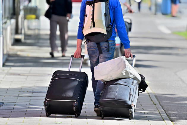 Everything with you With suitcases, backpack and bag it goes on the big journey Munich Bavaria Germany Copyright: xRolfxPossx