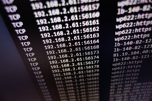 Symbolic image hacker attack ILLUSTRATION about hacker cyber attack A Netstat listing is seen on a computer screen , Frankfurt am Main Germany