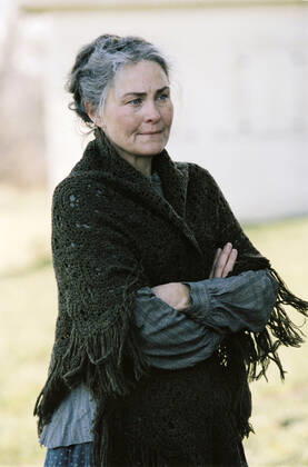 THE VILLAGE US 2004 THE VILLAGE US 2004 CHERRY JONES Date: 2004. Strictly editorial use only in conjunction with the promotion of the film. Credit line mandatory. This image is copyright of the film company and is supplied under the terms of issue as film still. No commercial or book cover use permitted without prior consent from the film company.  Mandatory credit line: Courtesy TOUCHSTONE PICTURES BLINDING EDGE PRODUCTIONS SCOTT RUDING PRODUCTIONS Ronald Grant Mary Evans