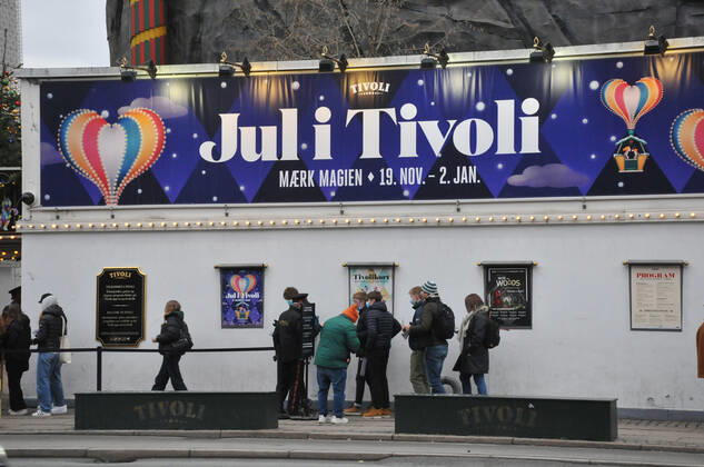 Copenhagen Denmark. 07 December 2021 Tvoli garden christmas visitor showing corona passport at enterance in danis capiatl (Photo..Francis Joseph Dean Dean Pictures)