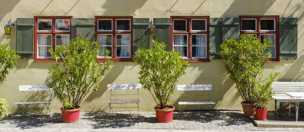 House facade with plants and chairs, Dinkelsbühl, Middle Franconia, Bavaria, Germany 1100402129