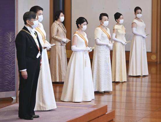 New Year ceremony by Japan s imperial family Japanese Emperor Naruhito (L) and Empress Masako (2nd from L) attend a scaled-down New Year s ceremony at the Imperial Palace in Tokyo on Jan. 1, 2022, wearing masks for protection against the coronavirus. (Pool photo)  A14AA0001175249P