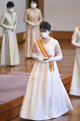 New Year ceremony by Japan s imperial family Japanese Princess Aiko, the only child of Emperor Naruhito and Empress Masako, is pictured after attending a scaled-down New Year s ceremony at the Imperial Palace in Tokyo on Jan. 1, 2022, wearing masks for protection against the coronavirus. (Pool photo)  A14AA0001175251P