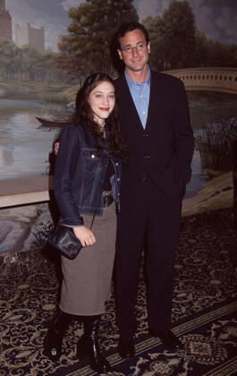 Kat Dennings and Bob Saget attend the WB Upfront 2001 at the Sheraton New York Hotel & Towers in New York City on May 15, 2001. Photo Copyright: xx