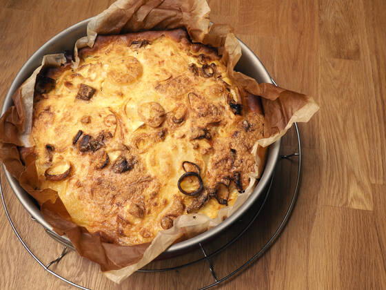 Quiche with potatoes and leeks in a springform pan, vegetarian food, healthy eating