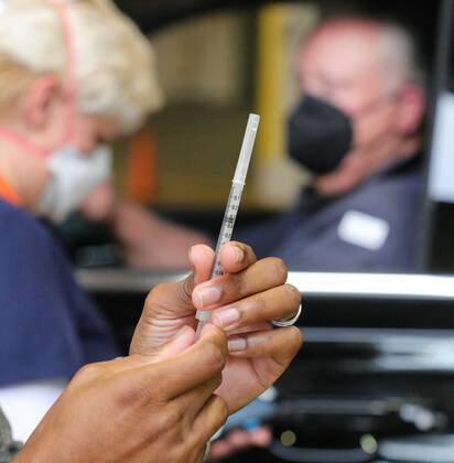 February 8, 2021, Orlando, FL, USA: A Florida resident prepares to get vaccinated at the Orange County Convention Center in Orlando, Florida on Monday, Feb. 8, 2021. The Florida Department of Health was administering COVID-19 vaccinations at the convention center s North Concourse loading dock, by appointment only. Now Miami-Dade has surpassed the grim milestone of 1 million COVID-19 cases. Orlando USA - ZUMAm67_ 20210208_zaf_m67_043 Copyright: xJoexBurbankx