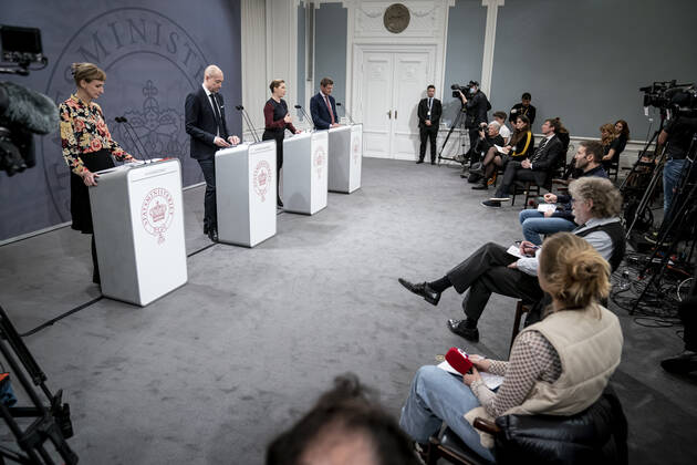 Prime Minister Mette Frederiksen S, Minister of Health Magnus Heunicke S, academic director of the Statens Serum Institut Tyra Grove Krause and director of the National Board of Health Soeren Brostroem during a press conference on the corona situation in the Mirror Room in the Prime Ministers Office, Wednesday 26 January 2022, Copenhagen Denmark  Copyright: RitzauxScanpix MadsxClausxRasmussenx cop104 spdk20220126-210234-L