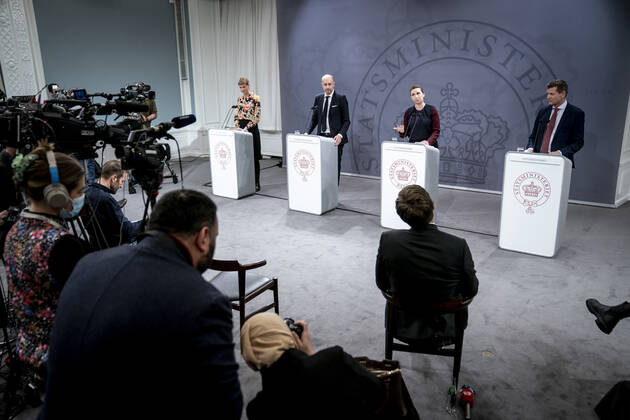 Prime Minister Mette Frederiksen S, Minister of Health Magnus Heunicke S, academic director of the Statens Serum Institut Tyra Grove Krause and director of the National Board of Health Soeren Brostroem during a press conference on the corona situation in the Mirror Room in the Prime Ministers Office, Wednesday 26 January 2022, Copenhagen Denmark  Copyright: RitzauxScanpix MadsxClausxRasmussenx cop104 spdk20220126-211927-L