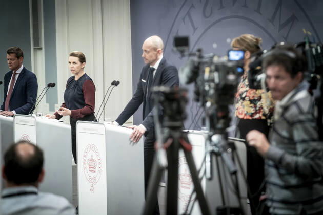 Prime Minister Mette Frederiksen S, Minister of Health Magnus Heunicke S and Director of the National Board of Health Soeren Brostroem photographed in a mirror during a press conference on the corona situation in the Mirror Room in the Prime Ministers Office, Wednesday 26 January 2022, Copenhagen Denmark  Copyright: RitzauxScanpix MadsxClausxRasmussenx cop104 spdk20220126-212531-L