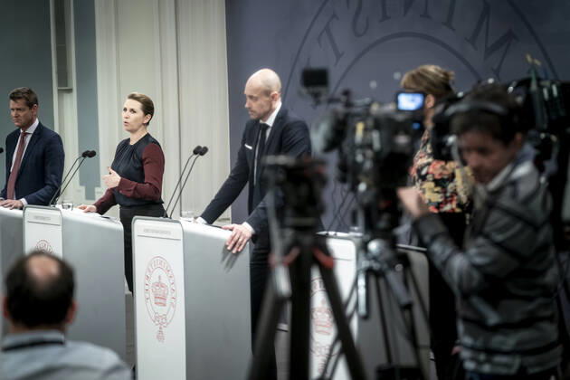 Prime Minister Mette Frederiksen S, Minister of Health Magnus Heunicke S and Director of the National Board of Health Soeren Brostroem photographed in a mirror during a press conference on the corona situation in the Mirror Room in the Prime Ministers Office, Wednesday 26 January 2022, Copenhagen Denmark  Copyright: RitzauxScanpix MadsxClausxRasmussenx cop104 spdk20220126-212538-L