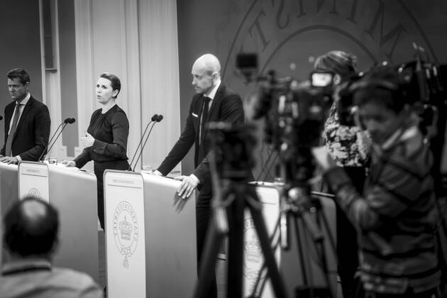 Prime Minister Mette Frederiksen S, Minister of Health Magnus Heunicke S and Director of the National Board of Health Soeren Brostroem photographed in a mirror during a press conference on the corona situation in the Mirror Room in the Prime Ministers Office, Wednesday 26 January 2022, Copenhagen Denmark  Copyright: RitzauxScanpix MadsxClausxRasmussenx cop104 spdk20220126-212558-L
