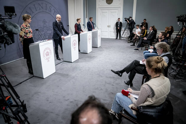 Prime Minister Mette Frederiksen S, Minister of Health Magnus Heunicke S, academic director of the Statens Serum Institut Tyra Grove Krause and director of the National Board of Health Soeren Brostroem during a press conference on the corona situation in the Mirror Room in the Prime Ministers Office, Wednesday 26 January 2022, Copenhagen Denmark  Copyright: RitzauxScanpix MadsxClausxRasmussenx cop104 spdk20220126-212608-L