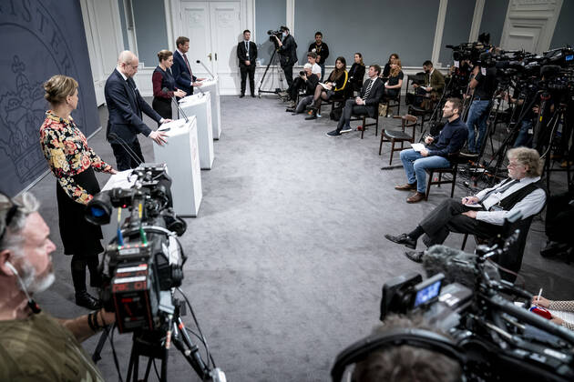 Prime Minister Mette Frederiksen S, Minister of Health Magnus Heunicke S, academic director of the Statens Serum Institut Tyra Grove Krause and director of the National Board of Health Soeren Brostroem during a press conference on the corona situation in the Mirror Room in the Prime Ministers Office, Wednesday 26 January 2022, Copenhagen Denmark  Copyright: RitzauxScanpix MadsxClausxRasmussenx cop104 spdk20220126-212734-L