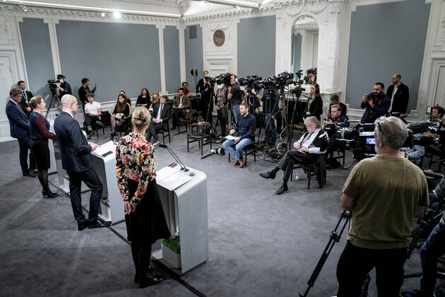 Prime Minister Mette Frederiksen S, Minister of Health Magnus Heunicke S, academic director of the Statens Serum Institut Tyra Grove Krause and director of the National Board of Health Soeren Brostroem during a press conference on the corona situation in the Mirror Room in the Prime Ministers Office, Wednesday 26 January 2022, Copenhagen Denmark  Copyright: RitzauxScanpix MadsxClausxRasmussenx cop104 spdk20220126-212831-L