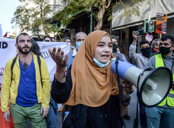 Greece: Protest against migrant pushbacks and border violence in Athens A migrant woman from Afghanistan shouts slogans during a protest against violence at the Greek-Turkish border. Hundreds of protesters hit the streets of the Greek capital on Sunday, to protest what they say are Greece’s pushbacks of migrants and refugees at the border with Turkey. Athens Greece Copyright: DimitrisxAspiotis