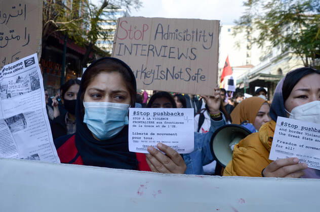 Greece: Protest against migrant pushbacks and border violence in Athens Women migrants from Afghanistan hold signs that read Stop pushbacks during a rally against Greece’s alleged pushbacks of migrants and refugees at the border with Turkey. Athens Greece Copyright: DimitrisxAspiotis