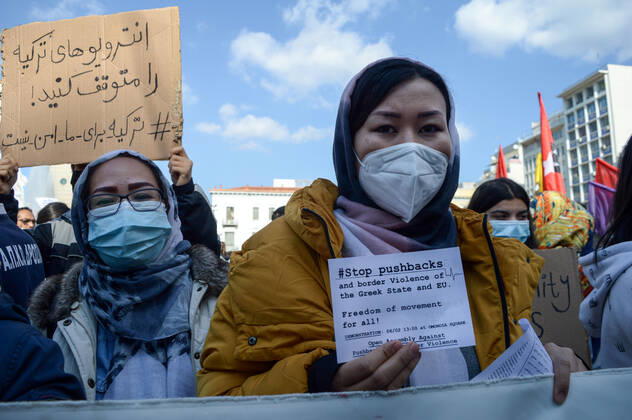 Greece: Protest against migrant pushbacks and border violence in Athens Women migrants from Afghanistan hold signs that read Stop pushbacks during a rally against Greece’s alleged pushbacks of migrants and refugees at the border with Turkey. Athens Greece Copyright: DimitrisxAspiotis