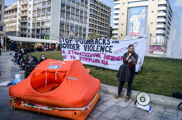 Greece: Protest against migrant pushbacks and border violence in Athens A woman activist addresses the rally as she stands next to a life raft and a banner that reads: Stop pushbacks and border violence . Hundreds of protesters marched through central Athens Sunday in protest at what they claim are Greece s pushbacks of migrants and refugees at the border with Turkey. Athens Greece Copyright: DimitrisxAspiotis