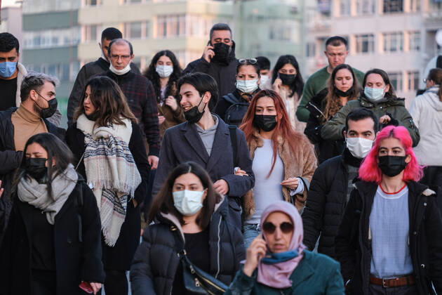People wearing face masks walk on a street in Istanbul Turkey, on February 21, 2022. Turkey reports 85,026 newly confirmed COVID-19 cases. ( Copyright: CumhurxYetmezx-xDepoxPhotos 17437187