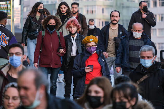 People wearing face masks walk on a street in Istanbul Turkey, on February 21, 2022. Turkey reports 85,026 newly confirmed COVID-19 cases. ( Copyright: CumhurxYetmezx-xDepoxPhotos 17437188