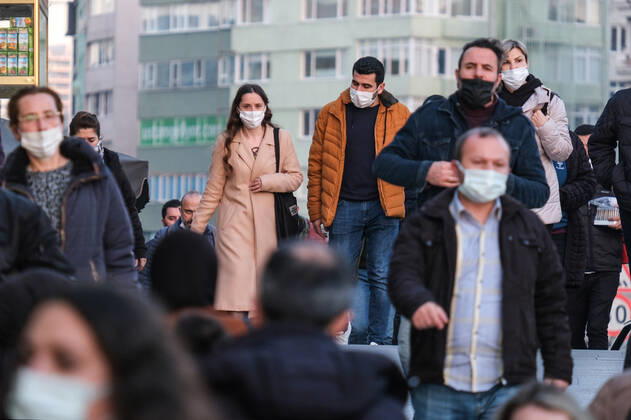 People wearing face masks walk on a street in Istanbul Turkey, on February 21, 2022. Turkey reports 85,026 newly confirmed COVID-19 cases. ( Copyright: CumhurxYetmezx-xDepoxPhotos 17437189