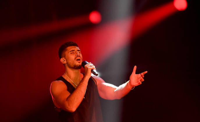 EUROVISION AUSTRALIA FINAL, Andrew Lambrou is seen performing the song Electrify during the Eurovision Australia Decides 2022 final at the Gold Coast Convention and Exhibition Centre on the Gold Coast, Saturday, February 26, 2022. ( NO ARCHIVING, EDITORIAL USE ONLY, NO USE IN BOOKS WITHOUT CONSENT GOLD COAST QLD AUSTRALIA  Copyright: xDARRENxENGLANDx 20220226001628332640