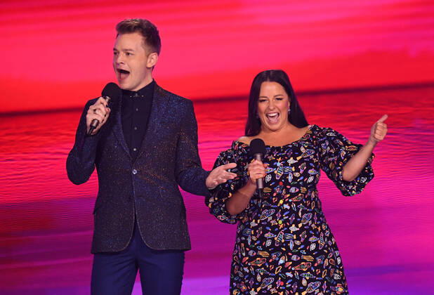 EUROVISION AUSTRALIA FINAL, Host s Joel Creasey (left) and Myf Warhurst (right) are seen during the Eurovision Australia Decides 2022 final at the Gold Coast Convention and Exhibition Centre on the Gold Coast, Saturday, February 26, 2022. ( NO ARCHIVING, EDITORIAL USE ONLY, NO USE IN BOOKS WITHOUT CONSENT GOLD COAST QLD AUSTRALIA Copyright: xDARRENxENGLANDx 20220227001628412805