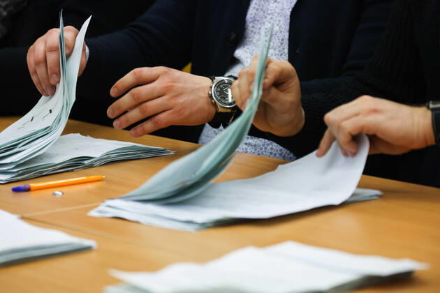 MINSK, BELARUS â€“ FEBRUARY 27, 2022: Election commission staff count votes after the 2022 Belarusian constitutional referendum at polling station No 50. In August 2020, mass protests erupted in major cities across Belarus after the results of the 2020 Belarusian presidential election were announced. Belarusian President Lukashenko announced plans for amendments to the constitution and his readiness to redistribute presidential powers to the other branches of government. Peter Kovalev TASS  TS125A15